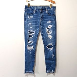 AE Super Low Jegging Distressed Blue Jeans
